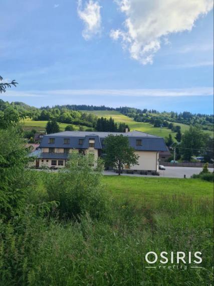 Slnečný pozemok na výstavbu rodinného domu v centre obce