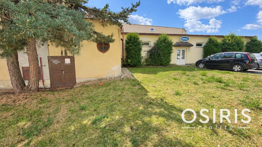 Komerčná budova s výrobnými a skladovými priestormi + 6x murovaná garáž